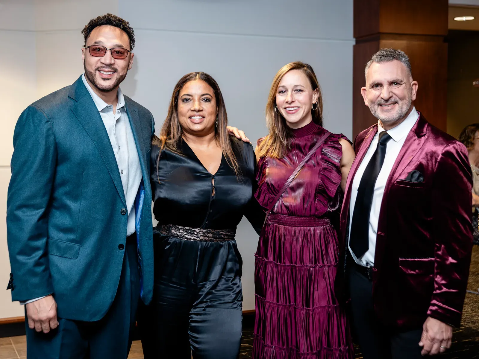 Guests dressed for the Caring for Kids Gala