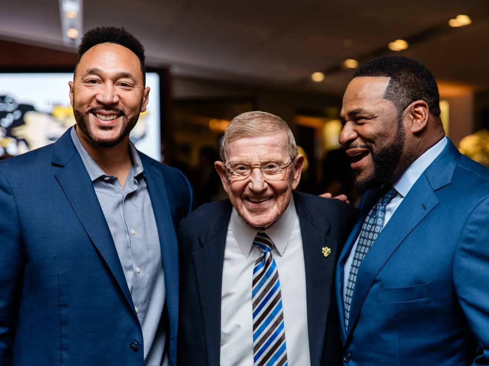 Guests sharing a laugh at the gala